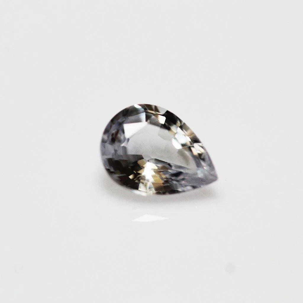 0.83ct Pear Natural Violet Colourless Ceylon Sapphire | Colourless Sapphire