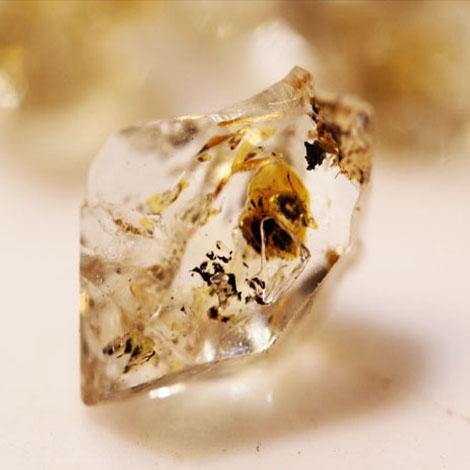 141 carat Natural Double Terminated Quartz Crystal with Petroleum Inclusion